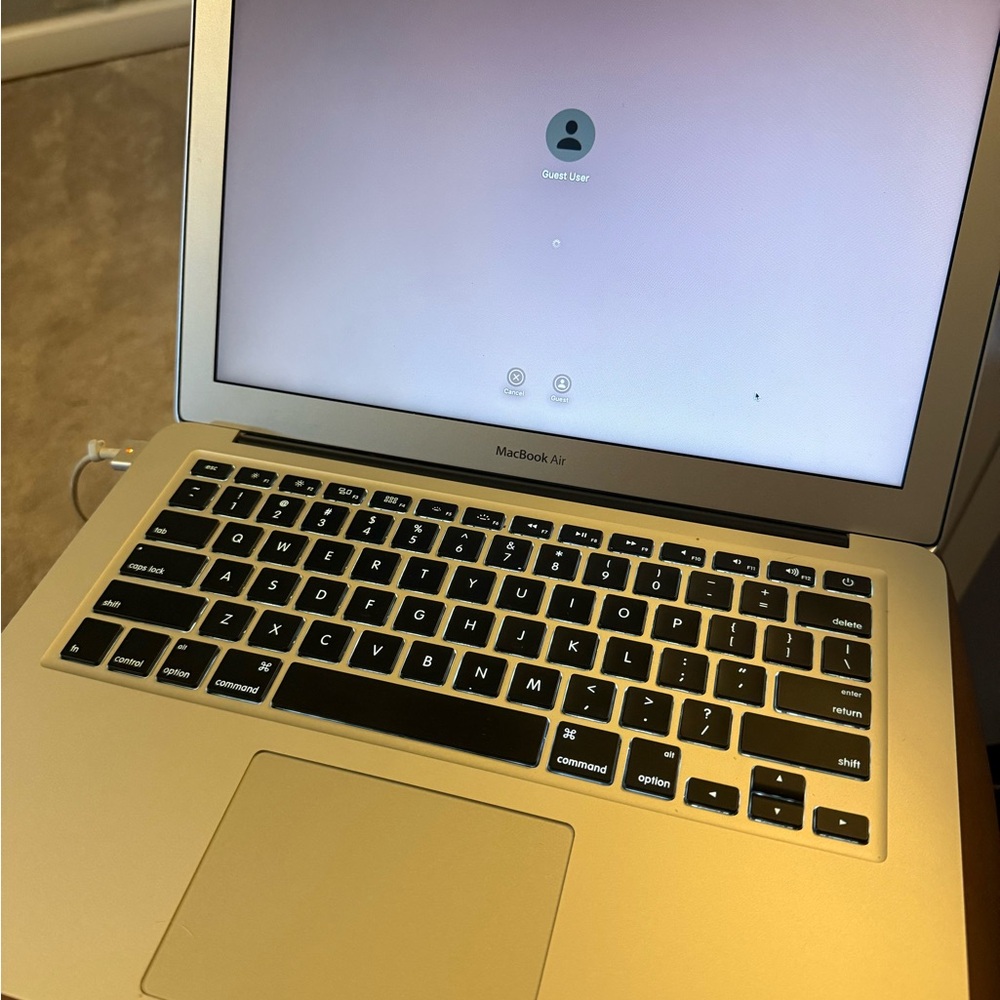 Apple Silver MacBook Laptop with Minimalist Design and Backlit Keyboard